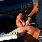 How Can You Save on Auto Insurance with an SR-22 Requirement? 7 Writing a ticket
