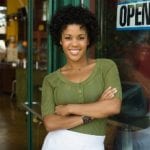 Insurance For Your Floral Business 10 Smiling woman with arms folded