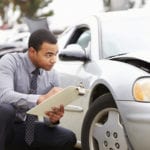 Car Insurance Charlotte, NC: 10 Ways to Find the Best Quote 1 Loss Adjuster Inspecting Car Involved In Accident